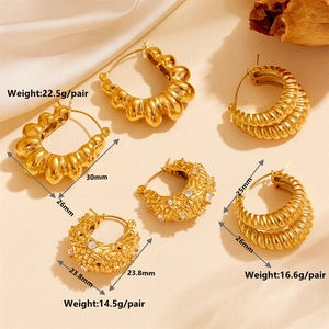 Three pairs of gold-plated geometric hoop earrings with zircon inlays and textured finishes