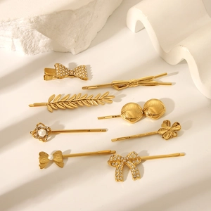 Set di fermagli per capelli in acciaio dorato con fiocchi, foglie e conchiglie con perle