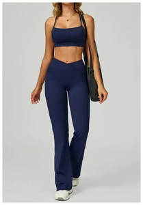 Detail of high-waisted yoga pants with V-shaped waistband and convenient side pockets