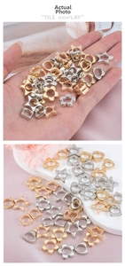 Dettaglio di perline CCB geometriche miste in oro e argento per gioielli fai-da-te