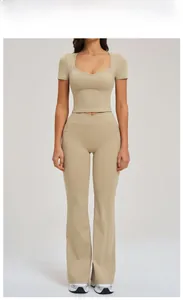 Women's light camel yoga set featuring short sleeve V-neck top and high waist flare pants