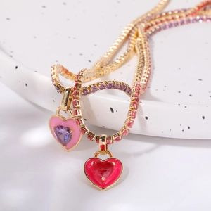 Luxurious tennis chain necklace with heart-shaped emerald zircon pendant in gold finish