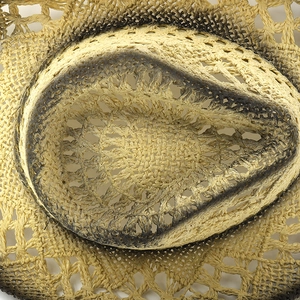Top-down close-up of gradient woven straw cowboy hat with vintage scorched finish