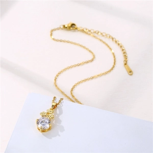 Golden stainless steel flower necklace with zircon pendant and elegant leaf detail