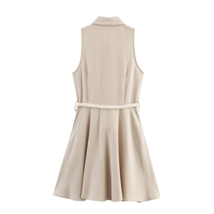 Detail view of beige linen dress back with white woven belt and crisp collar design