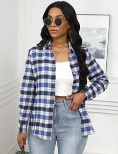 Detail of blue and white plaid pattern on women's classic long-sleeve casual shirt