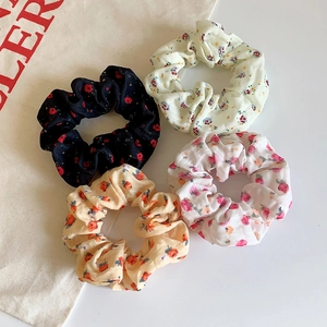 Set of 4 vintage floral bow scrunchies in black, cream, apricot, and pink fabric