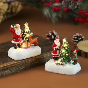 Mini maison de Noël lumineuse en résine avec Père Noël et renne décor de table