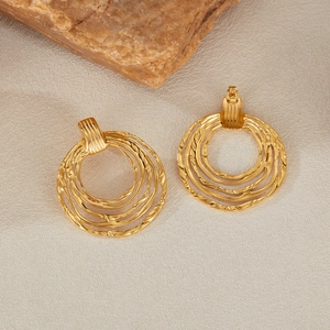 Golden irregular multi-layer textured hoop earrings with a vintage titanium steel finish