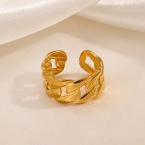 Minimalist gold chain link open ring for women on a silky cream fabric background