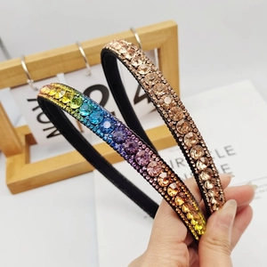 Baroque crystal headband with colorful rhinestones on a minimalist black fabric frame