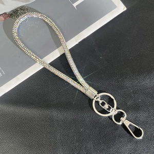 Detail shot of shimmering rhinestone lanyard with silver key ring and lobster clasp
