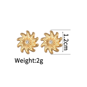 Macro view of 18k gold sunflower earrings with white zircon center, 1.2cm diameter