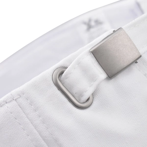 Macro shot of white cotton fabric with matte silver metal adjustment buckle and eyelet