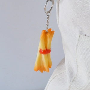 Realistic French fries keychain with ketchup on canvas bag with metal link chain