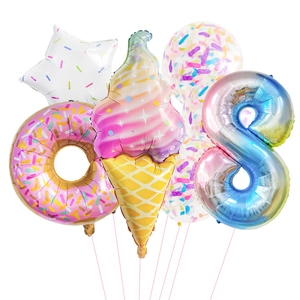 Detail of sweet dessert party balloon set including ice cream donut and rainbow number 8