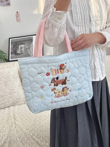 Quilted light blue tote bag with cute embroidered dachshund dogs and pink handles