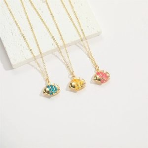 Colorful tropical fish enamel pendant necklace in gold-tone finish on white background