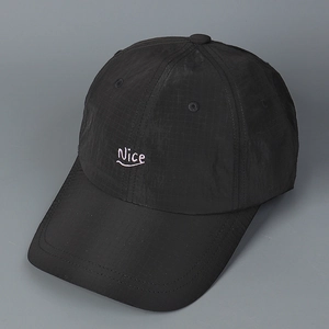 Detailed view of black plaid ripstop fabric and Nice embroidery on the baseball cap