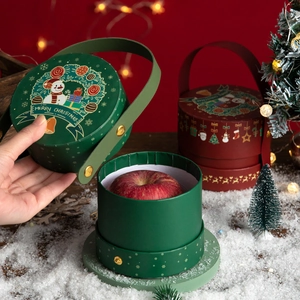 Christmas apple gift box set with leather handles and snowman illustrations in red and green
