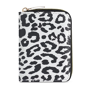 Minimalist black and white leopard print Saffiano card holder with gold zipper closure