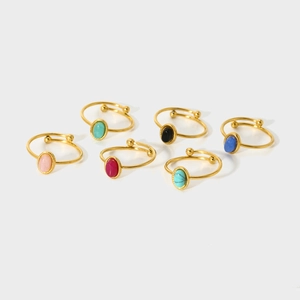 Detailed set of six gold adjustable rings featuring colorful oval natural stone inlays
