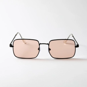 Macro detail of retro rectangular black metal frame sunglasses with light orange lenses