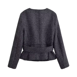 Women's black and white tweed jacket set featuring back waist tie and ruffled hem design