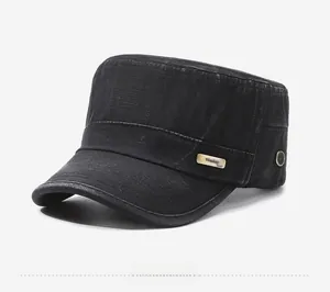 Detail view of black vintage washed cotton cadet cap with metallic logo and side eyelets