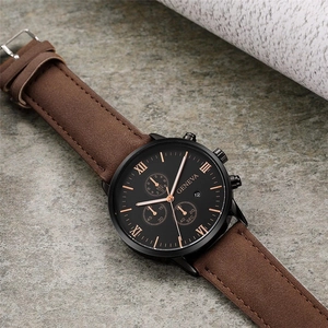 Business quartz watch with brown suede strap and black dial featuring Roman numerals