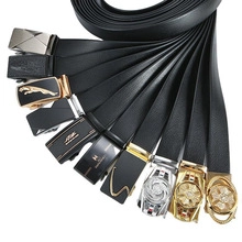 Detail view of assorted men's automatic leather belts with various alloy buckle styles