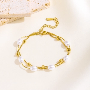 Elegant double-layered stainless steel bracelet with baroque pearls and gold beads