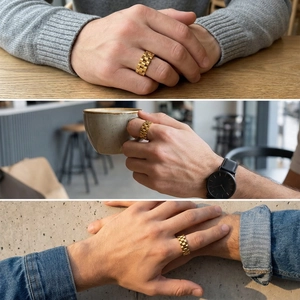 Detail of men's gold watch-strap style ring showcased in premium lifestyle settings