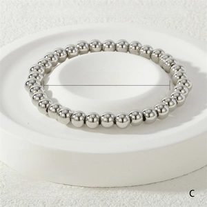 Detailed spec view of 6mm stretch metal bead bracelet in silver finish and 17cm size