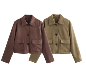 Close-up of suede short jackets with lapel collars, three buttons, and flap pockets