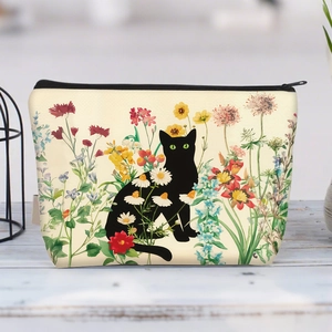 Detail der schwarzen Katze und Blumendruck auf Canvas-Kosmetiktasche mit Reißverschluss