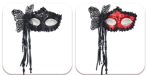 Detail of handheld masquerade masks with sequin finish, lace butterfly and tassels