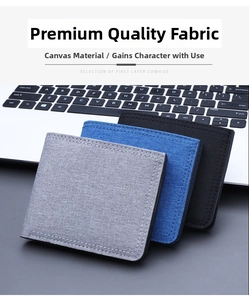 Detailed texture of slim canvas men's bi-fold wallets in grey, blue, and black colors