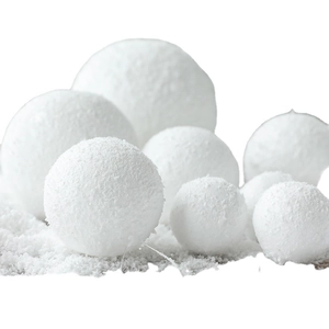 White foam snowballs in various sizes for Christmas tree decorations and festive party atmosphere