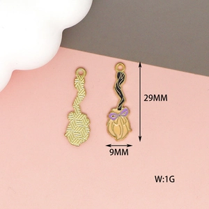 Detailed front and back view of a 29mm broom enamel charm for DIY jewelry making