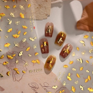 Ginkgo leaf 3D nail art stickers with golden metallic relief for autumn manicure