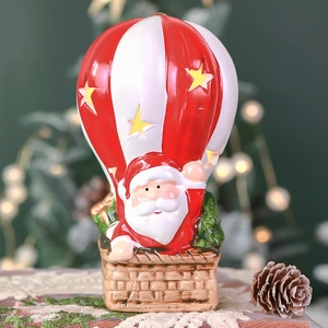 Light-up Santa in star hot air balloon Christmas decoration with festive glowing light effect