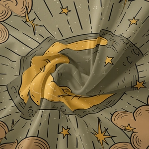 Detailed macro shot of the bohemian moon and star tapestry fabric texture and weaving
