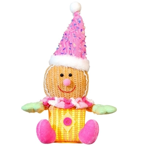 Illuminated gingerbread man plush toy with pink sequin hat and warm yellow LED light