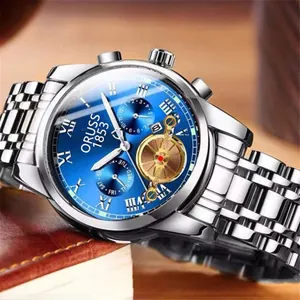 Detail of steel business watch with blue sunray dial and roman numerals