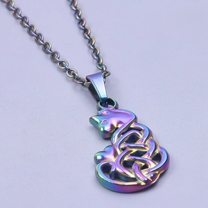 Macro shot of a rainbow-plated stainless steel cat pendant necklace with Celtic knot details