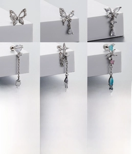 Detailed collection of silver butterfly heart and star earrings in high polish finish