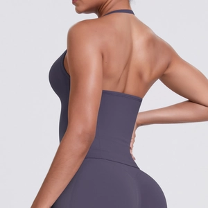 Detail of high-support purple racerback sports bra with seamless moisture-wicking fabric