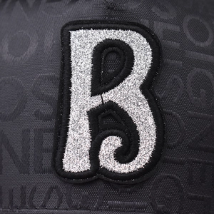 Black baseball cap with silver glitter B logo and all-over monogram jacquard pattern
