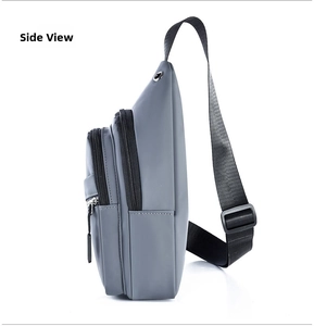 Side view of gray nylon sling bag showing zipper layers and metal earphone port